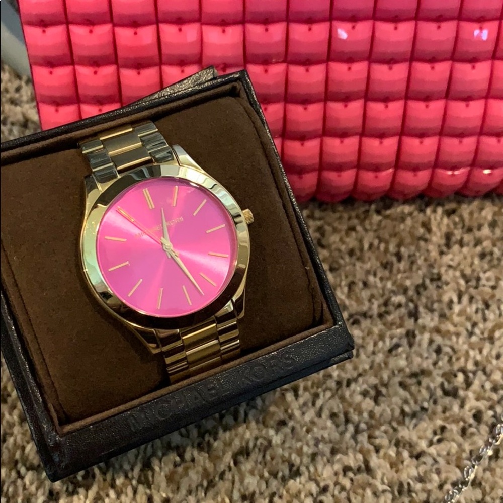 Gold and pink face Michael kors watch